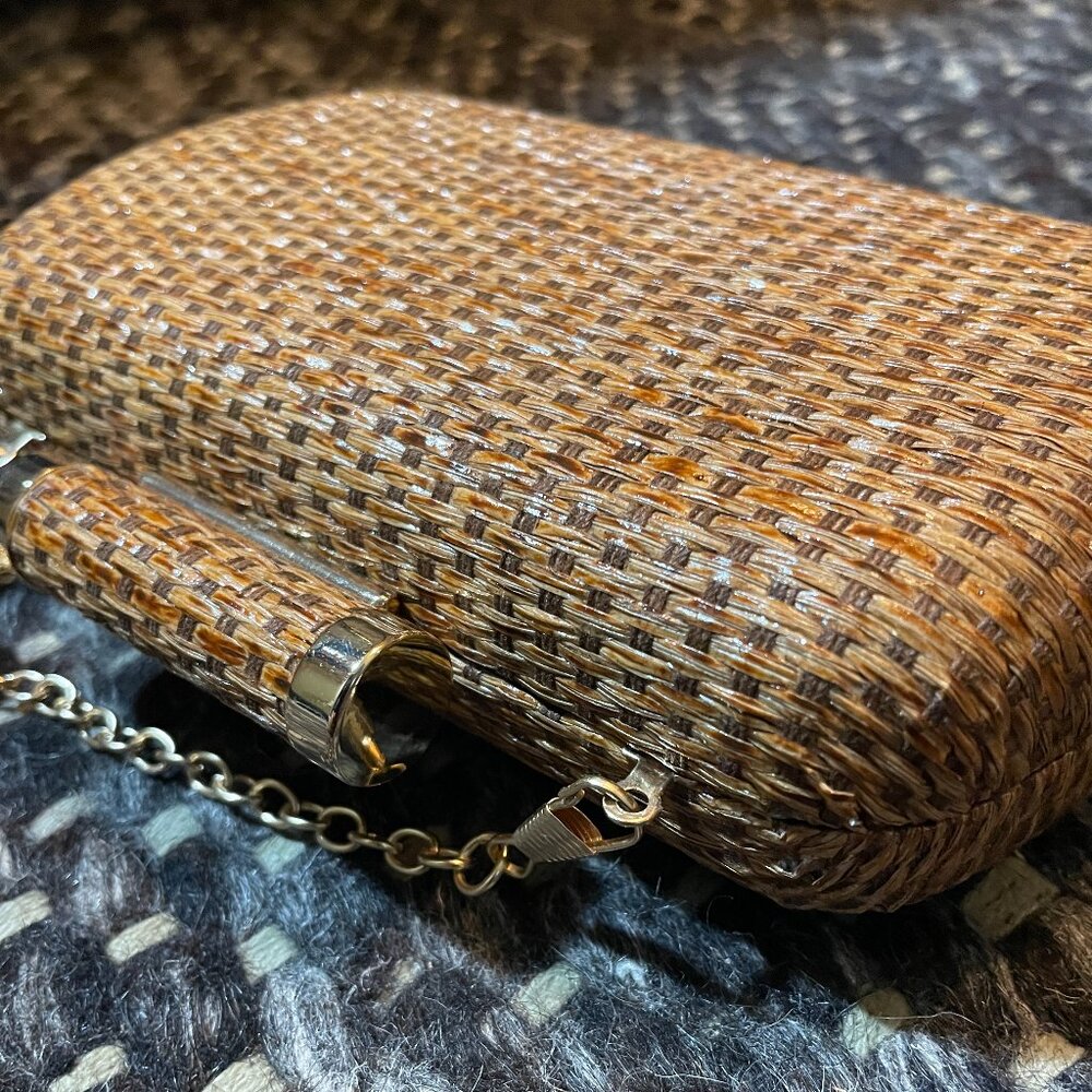 Snap close straw rattan style clutch with optional gold tone strap